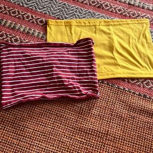 Two tube tops, one solid yellow and one red and white striped. Both size small.